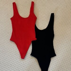 Two Wilfed Free Bodysuits